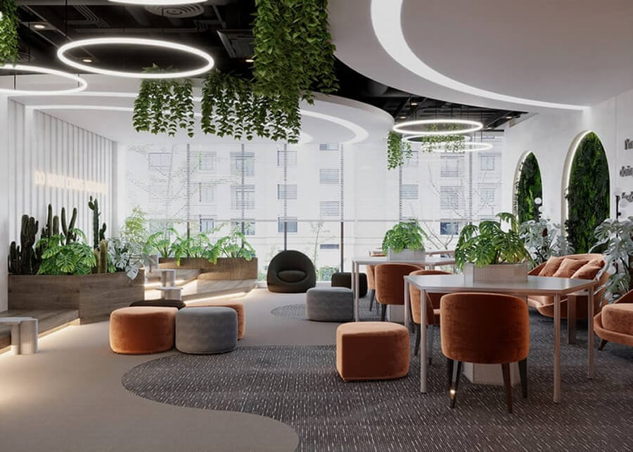 Khu vực nghỉ ngơi và giải trí dành cho nhân viên với nhiều sofa mềm và cây xanh trang trí
