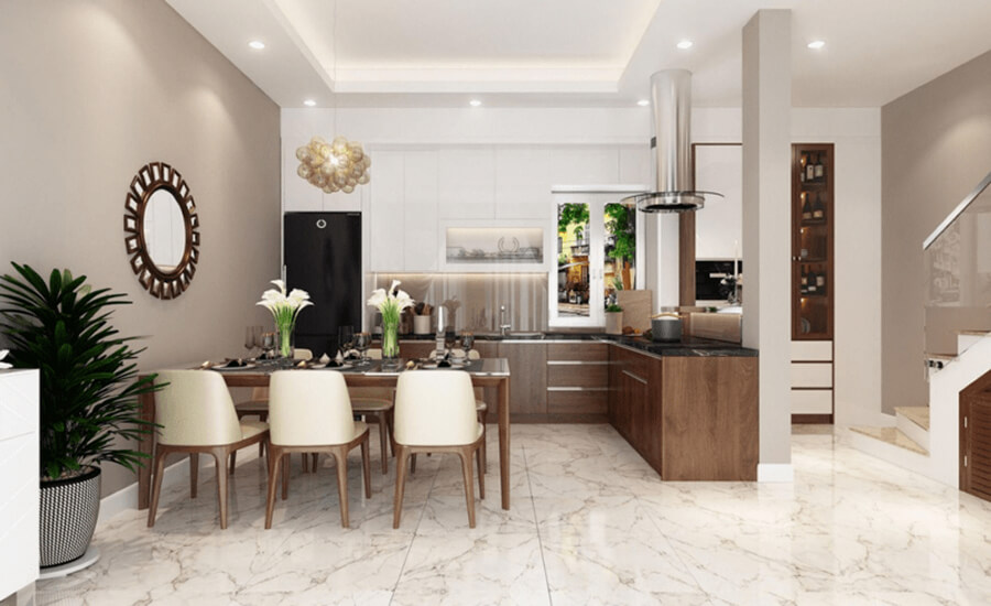 Phòng bếp nhà phố hiện đại với tủ bếp chữ L, mặt đá trắng vân mây và hệ đèn led dưới tủ tạo điểm nhấn tinh tế