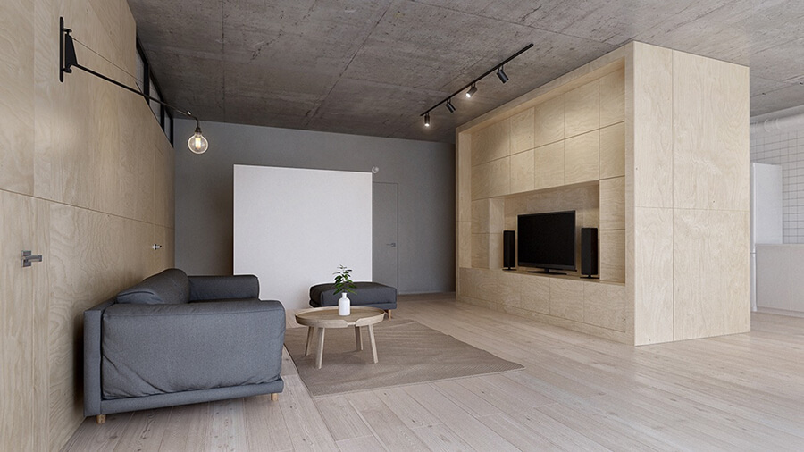 Phòng khách chung cư phong cách tối giản với sofa đơn sắc, bàn trà nhỏ và tường trơn không trang trí