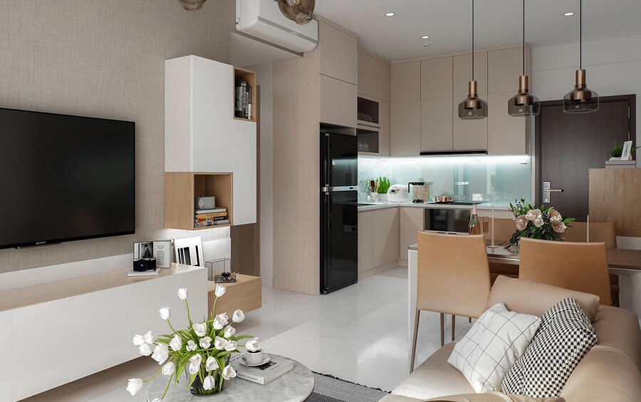 Phòng khách chung cư 1 phòng ngủ với sofa nhỏ gọn, bàn trà tròn và kệ tivi treo tường tối ưu diện tích
