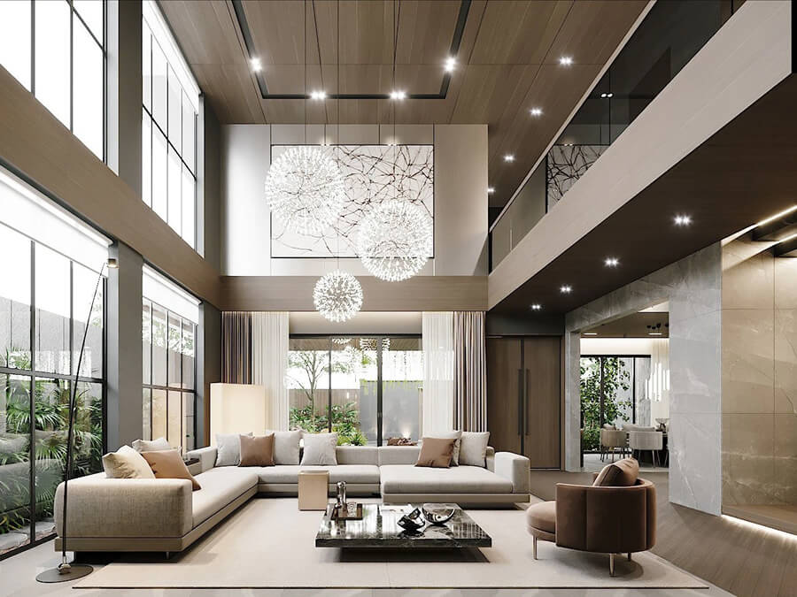 Phòng khách biệt thự hiện đại với sofa chữ L, bàn trà mặt đá và hệ cửa kính lớn mở ra sân vườn