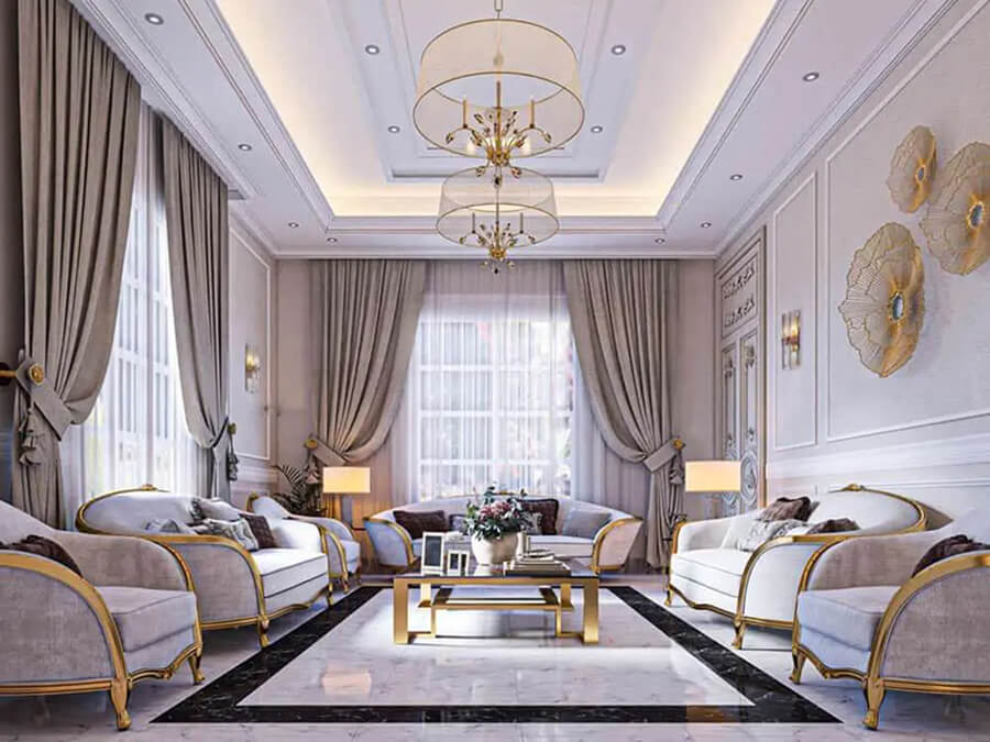 Phòng khách biệt thự tân cổ điển sử dụng sofa uốn lượn mềm mại, bàn trà mặt đá và trần thạch cao có hoa văn phức tạp