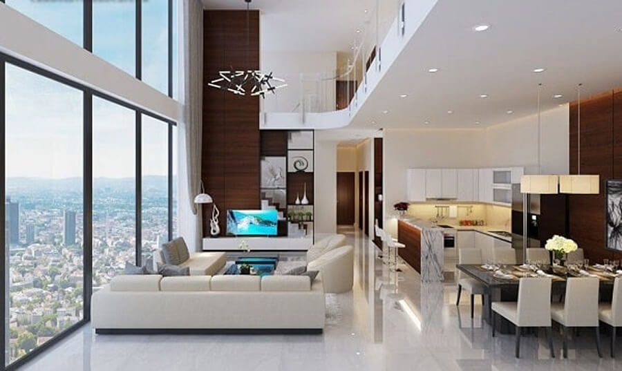 Phòng khách chung cư duplex với trần thông tầng cao, vách kính lớn và bộ sofa hiện đại sang trọng