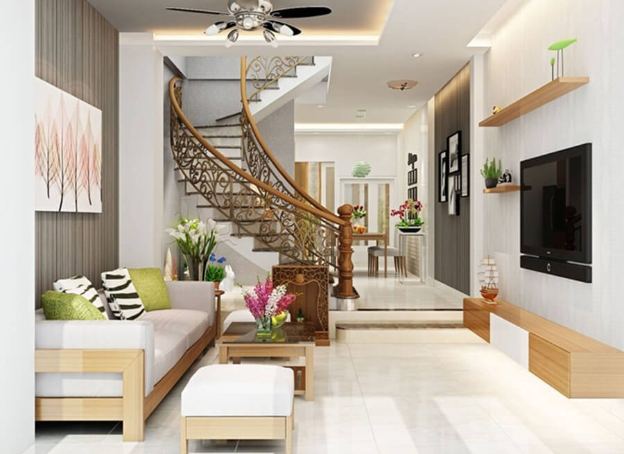 Phòng khách nhà ống phong cách tối giản với tông màu trắng – gỗ sáng, bố trí nội thất gọn gàng theo chiều sâu ngôi nhà